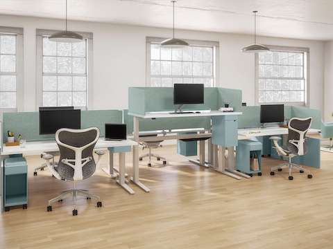 Open floorplate with six height-adjustable tables accented with Ambit Workspace Solutions in glacier and Mirra 2 chairs. Open floorplate with six height-adjustable tables accented with Ambit Workspace Solutions in glacier and Mirra 2 chairs.