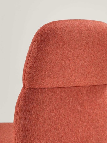 Detail view of an Asari chair by Herman Miller in canyon red.