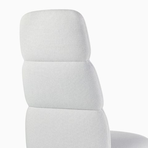 Detail view of a high-back Asari chair by Herman Miller in light grey without arms. Detail view of a high-back Asari chair by Herman Miller in light grey without arms.