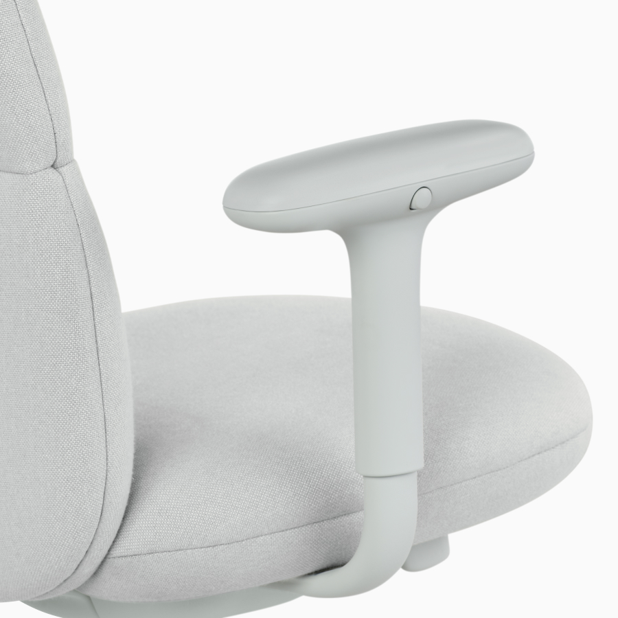 Detail view of an Asari chair by Herman Miller in light grey with height adjustable arms.