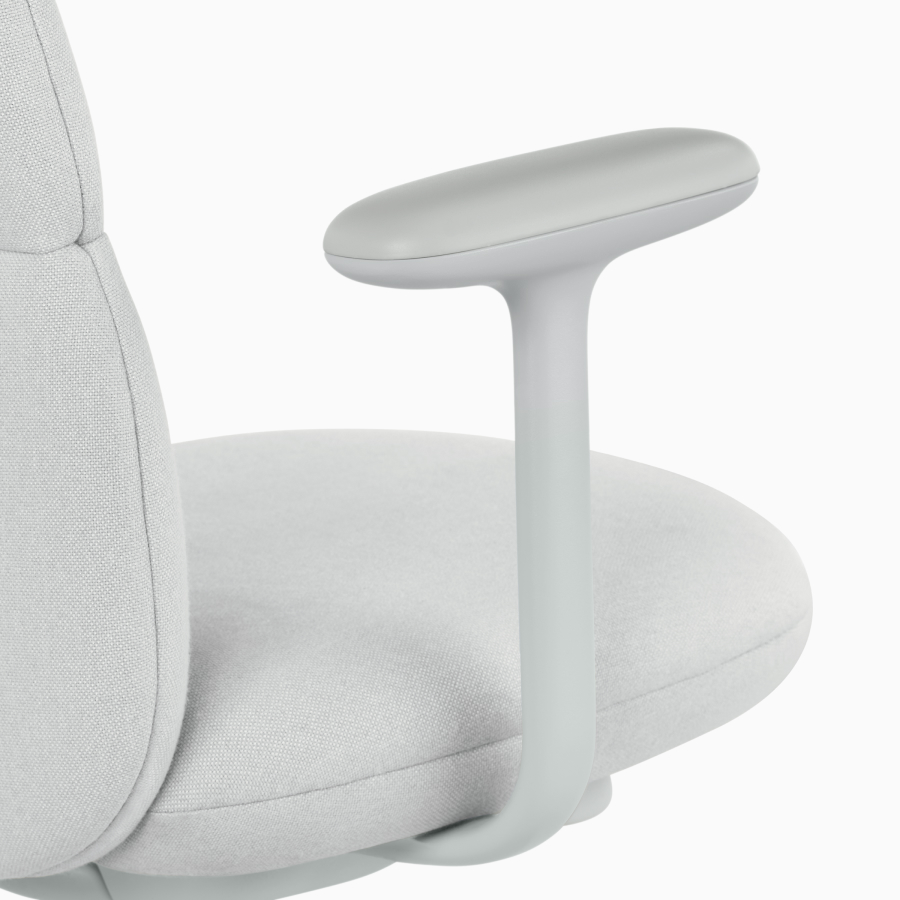 Detail view of an Asari chair by Herman Miller in light grey with fixed arms.