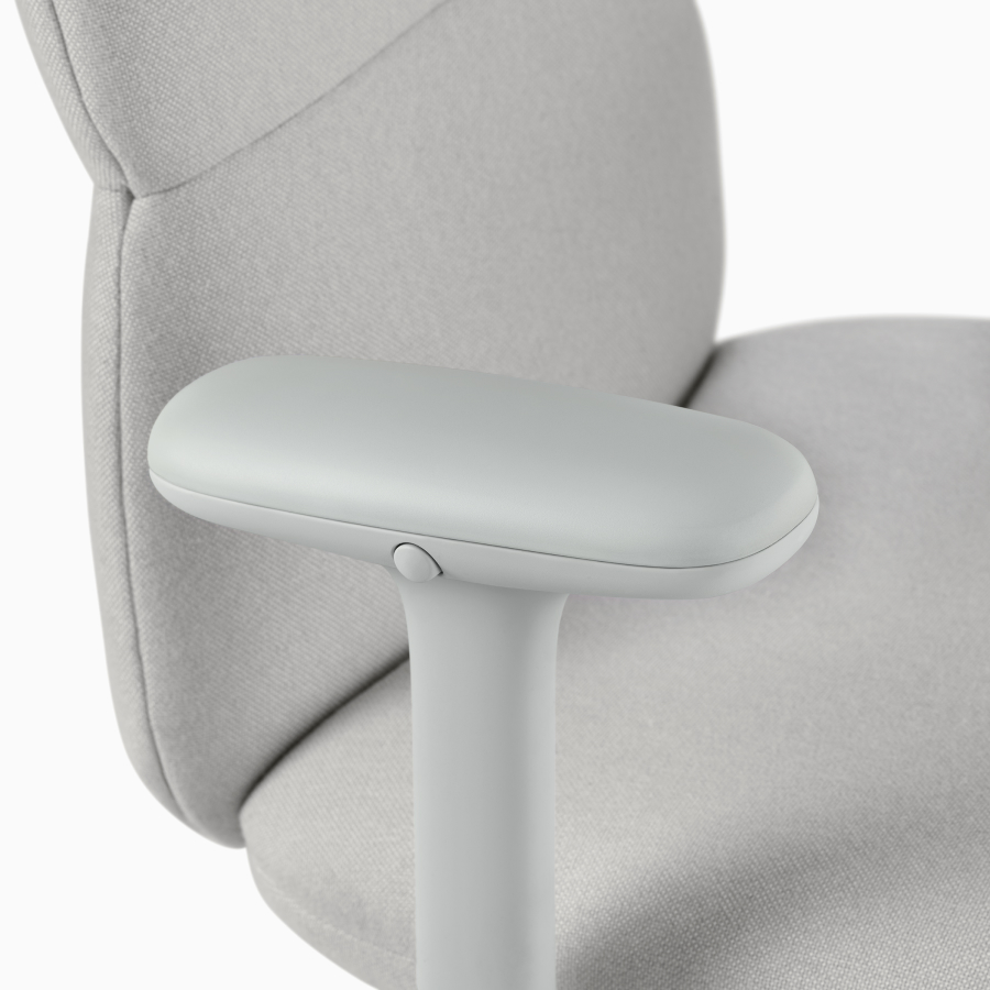 Detail view of an Asari chair by Herman Miller in light grey with height adjustable arms.