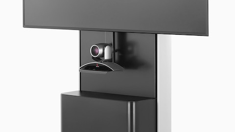 Primo piano di una webcam montata nella parte anteriore di un carrello AV / VC One al di sotto di un ampio display digitale. Primo piano di una webcam montata nella parte anteriore di un carrello AV / VC One al di sotto di un ampio display digitale.