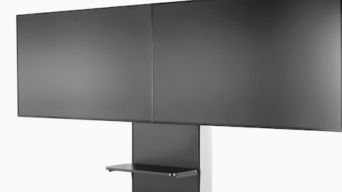 Close-up of the front of a black AV/VC One cart with two large digital monitors mounted to the front. Close-up of the front of a black AV/VC One cart with two large digital monitors mounted to the front.