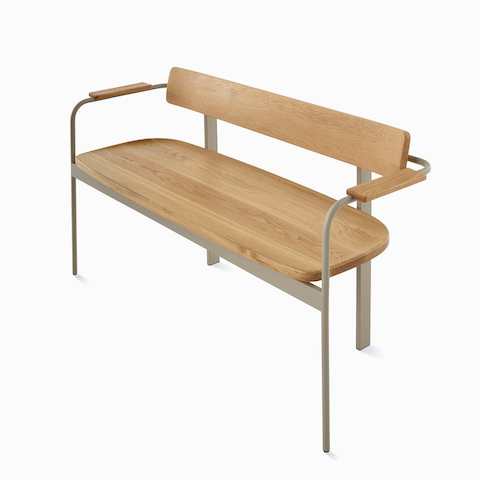 A Betwixt bench with an oak seat, backrest, and arms with a grey frame.