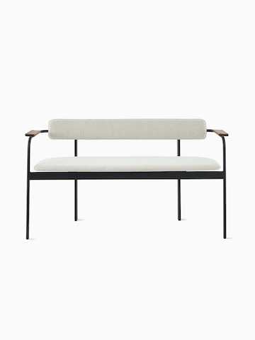 A Betwixt Bench with grey fabric seat and backrest, with walnut arms and a black frame.
