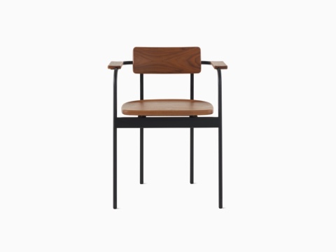 A Betwixt Chair with a walnut backrest, seat and arms with a black frame. A Betwixt Chair with a walnut backrest, seat and arms with a black frame.