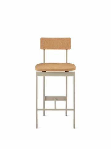 A counter height Betwixt Stool with cork seat and backrest, with a grey frame.