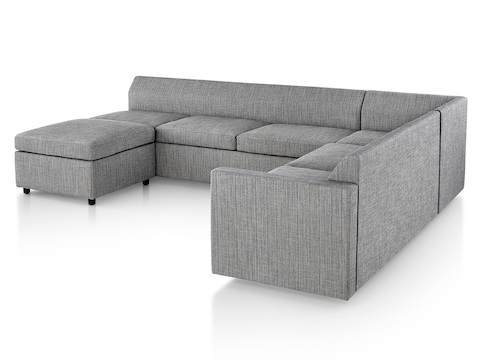 Anbausofa der Bevel Sofagruppe mit grau meliertem Textilbezug.