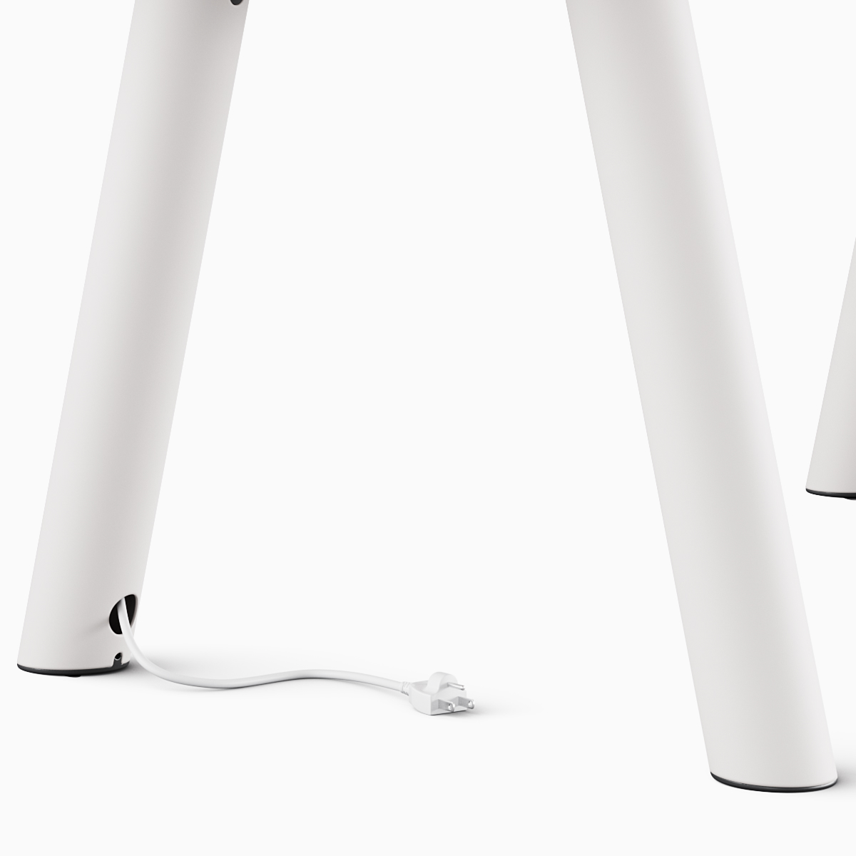 Cable management on white Boa Table.