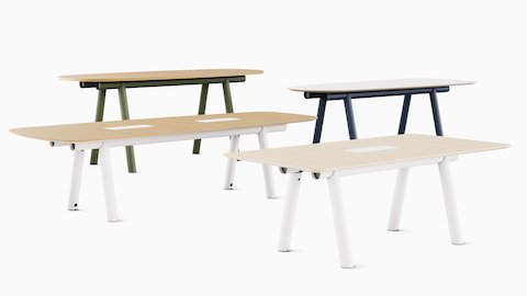 Group of four Boa Tables in various heights, colors, and table shapes.