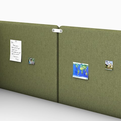 Detail of a green Bound Freestanding Screen in a booth configuration with a white OE1 Rectangular Table, viewed from an angle.