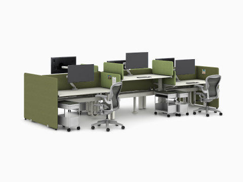 Assorted dark and light green Bound Screens mounted on a white Ratio workstation with six worksurfaces, grey Aeron Chairs and OE1 Storage Trolleys, viewed from an angle.