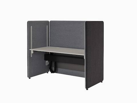 Angled view of light and dark grey Bound Sit-Stand Booth.