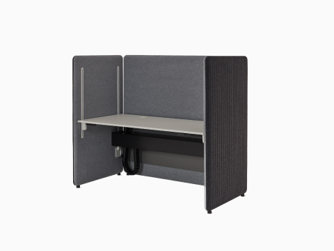 Angled view of light and dark grey Bound Sit-Stand Booth.