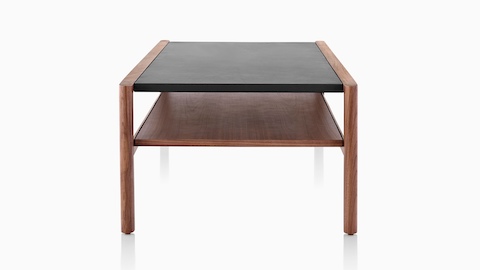 一个长方形的Brabo偶尔的桌子，从较窄的一端看，有一个黑色的上层和中等的木纹下层。
