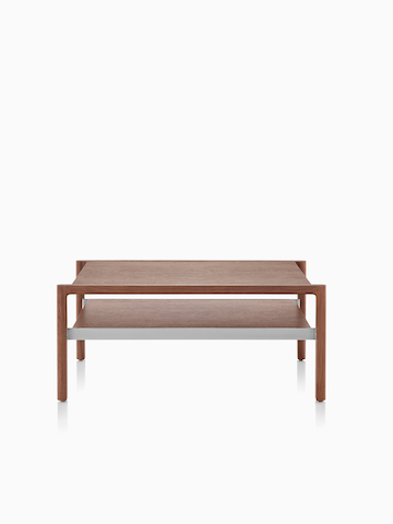 A rectangular Brabo Table with a medium wood finish.