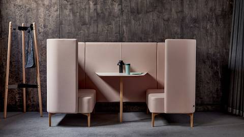 Pink 2-seat Pullman Booth with oak legs and white MFMDF table top, with Hudson Coat Stand.