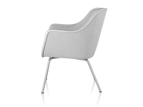 Four-leg Bumper Chair in light gray fabric, viewed from the side.