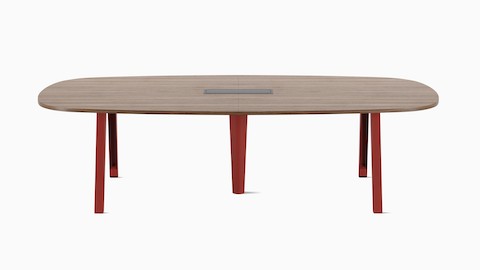 一张船形 Byne 会议桌，配 Bow 桌腿，周围环绕着 Eames Aluminum Group 座椅。