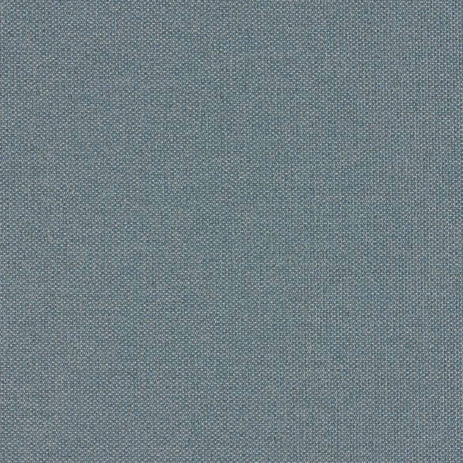 Una imagen en primer plano de una muestra de tejido azul. Seleccione para ir a la página de textiles de Canvas.