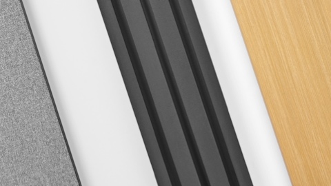 Imagem em close-up dos diferentes materiais da Canvas Vista como, por exemplo, tecido cinza, metal preto e madeira clara.