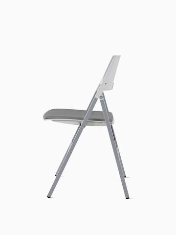 Side view of Axa Folding Chair with an upholstered back and seat in gray and silver metal frame and legs.