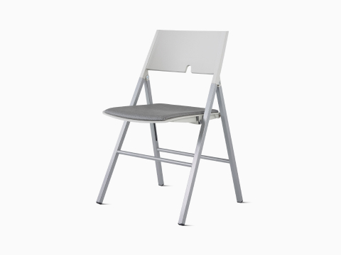 Angled front view of an Axa Folding Chair with an upholstered back and seat in gray and silver metal frame and legs. Angled front view of an Axa Folding Chair with an upholstered back and seat in gray and silver metal frame and legs.