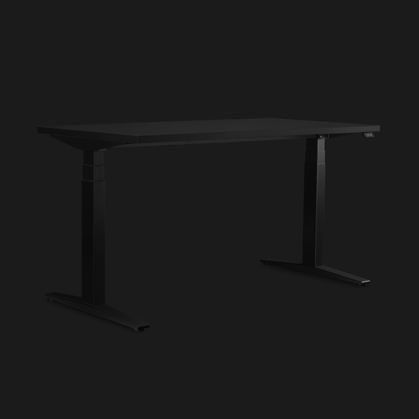Dark grey height-adjustable Ratio Gaming Desk shown on an angle with a dramatically lit black background.