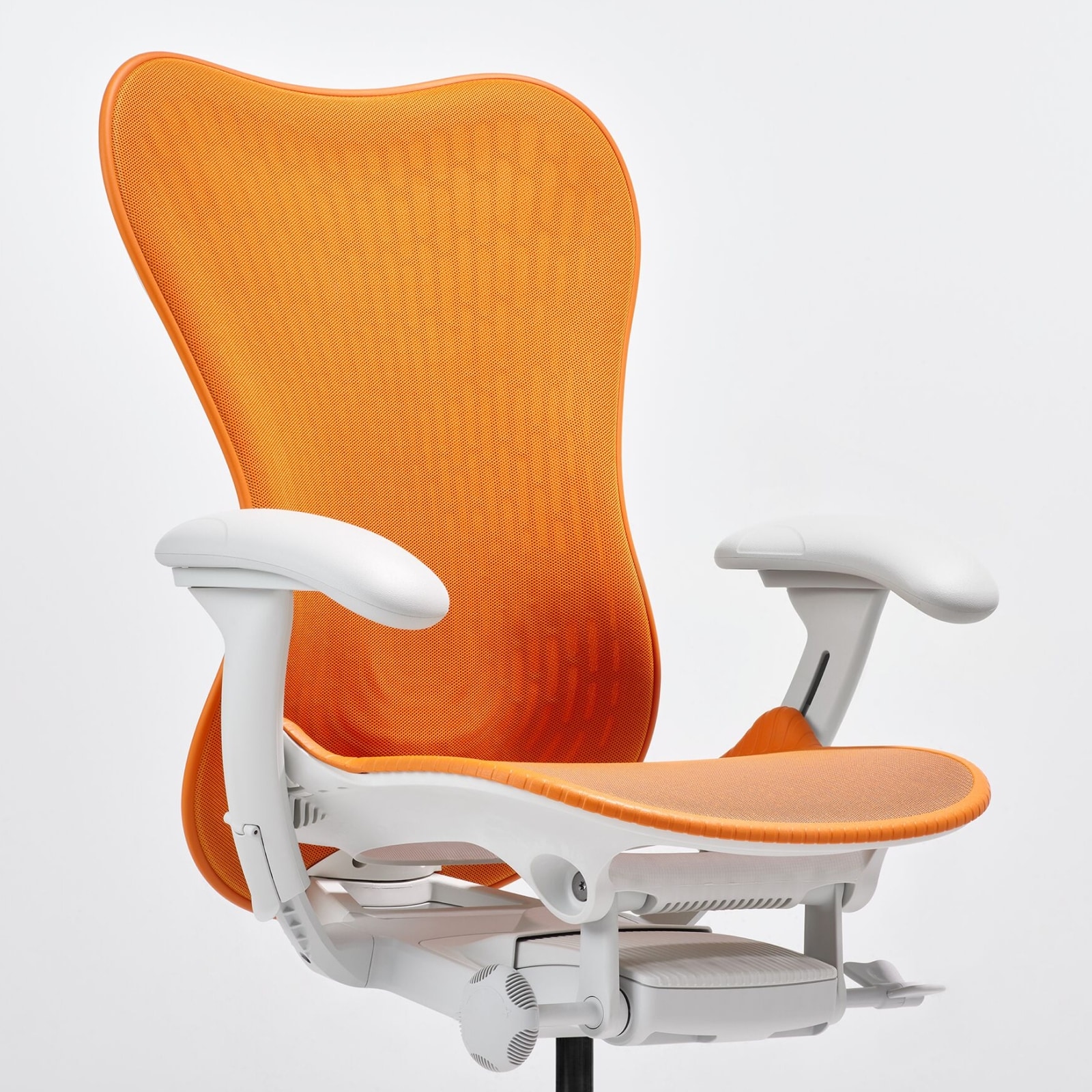 Front-angle view of a Mirra 2 Chair with a Butterfly back in ochre and alpine frame.