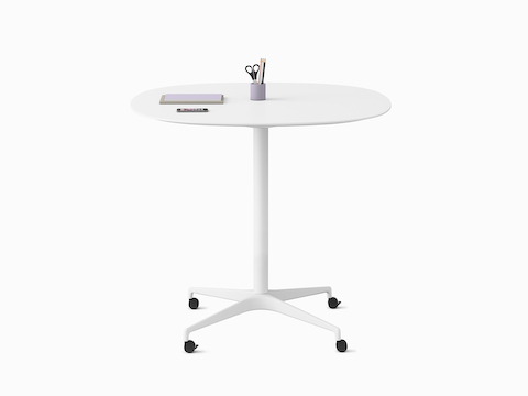 A soft square white Civic Table at standing height. Select to go to our standing height tables pages.
