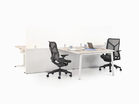 Catena Office Landscape with white legs, a light wood surface, and glass add-on screens. Black Cosm chairs accompany Catena.