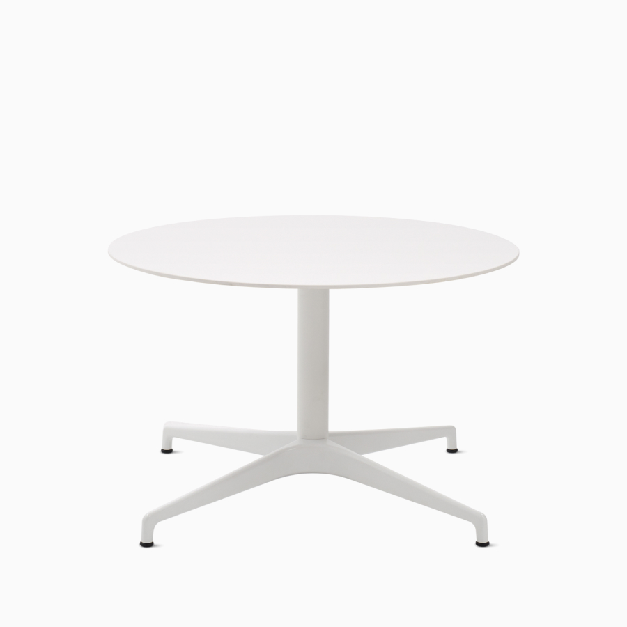 A round white Civic Table at lounge height.