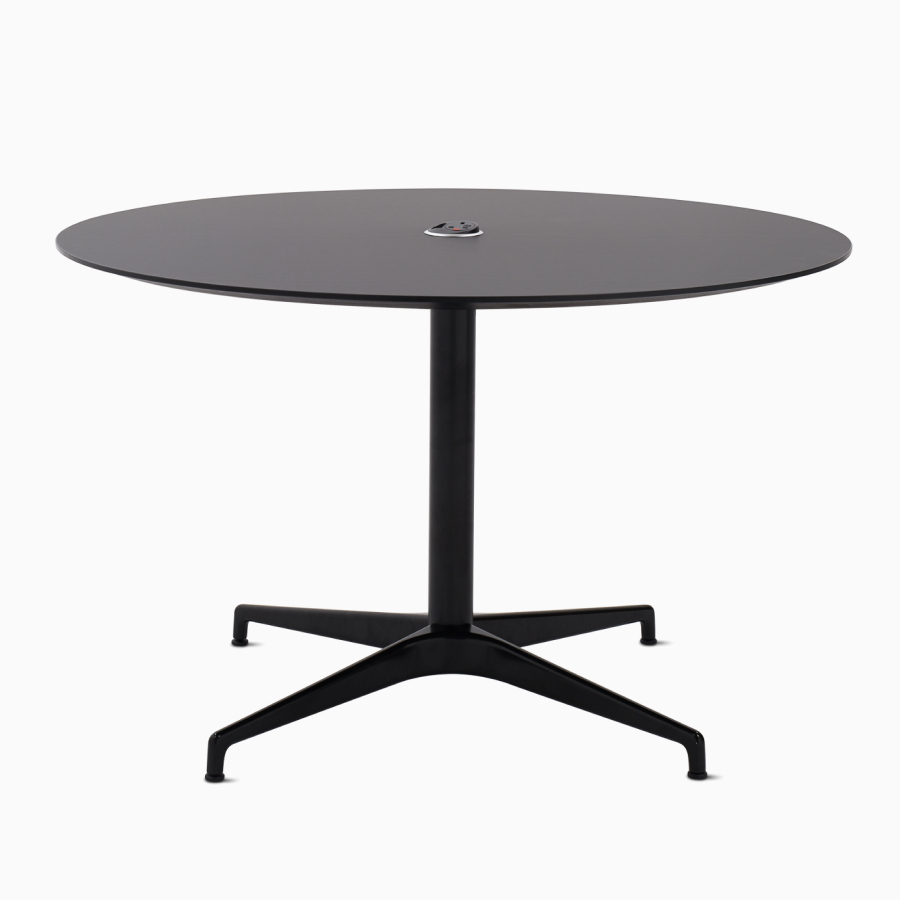 An all black, round Civic Table with a central power solution.
