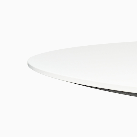 A round white Civic Table with a contrasting edge.