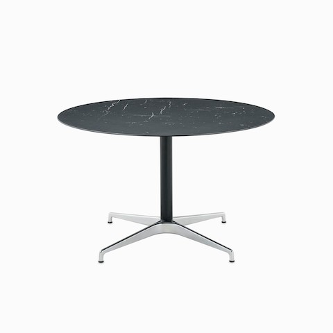 A round Civic Table with a black marble top. A round Civic Table with a black marble top.