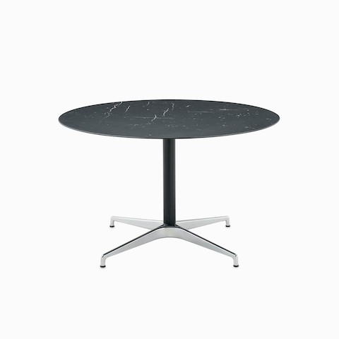 A round Civic Table with a black marble top.