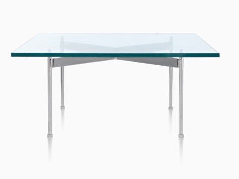 A rectangular glass-top Claw Table, showing the Claw-like metal cross brace.