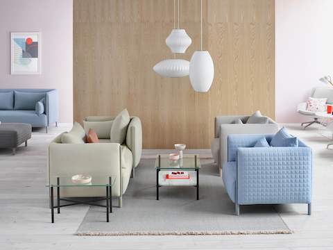 Modular and stand-alone ColourForm seating pieces of various pastels in a workplace lounge. 
