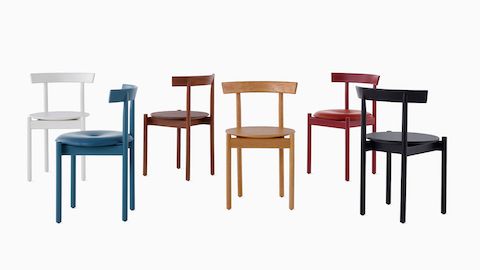 A group of Comma Chairs in different colorful finishes.