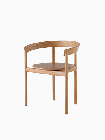 An oak Comma Chair with arms. Select to go to the Comma Chair product page.