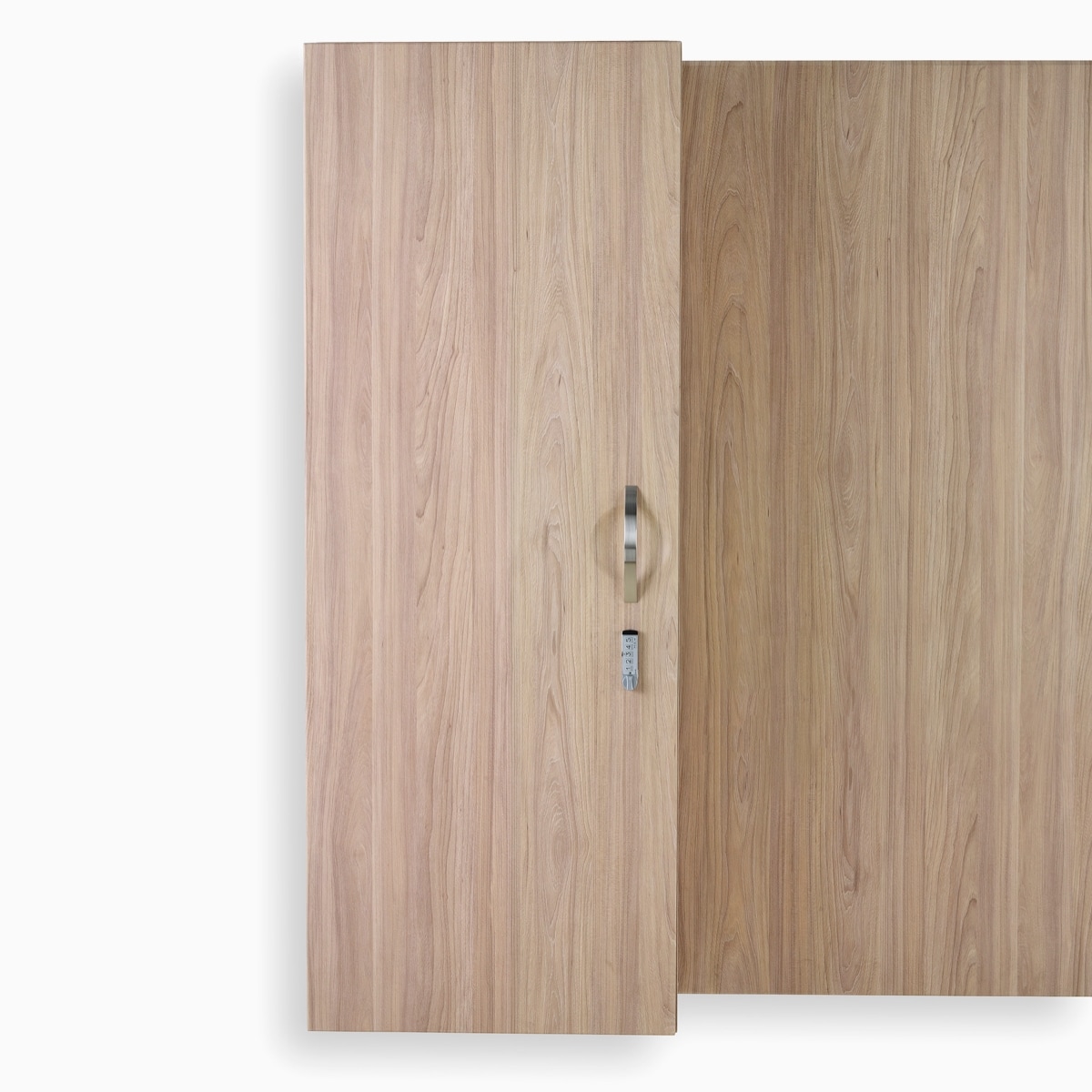 A close-up view of Compass System wardrobe cabinet in a medium wood finish.