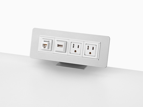 A surface-attached Connect Power and Data distributor with four connection points. A surface-attached Connect Power and Data distributor with four connection points.