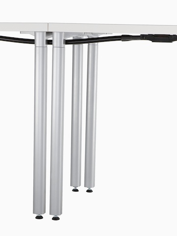Connect Modular Power cables running beneath adjacent work surfaces. Connect Modular Power cables running beneath adjacent work surfaces.