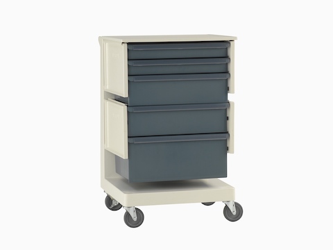 A Co/Struc System healthcare storage cart with casters and blue drawers. A Co/Struc System healthcare storage cart with casters and blue drawers.