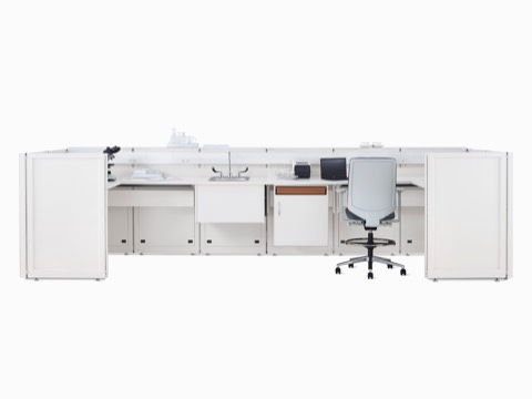 Co/Struc System laboratory bench in soft white with under surface storage, sink, and Verus Stool in light gray. Co/Struc System laboratory bench in soft white with under surface storage, sink, and Verus Stool in light gray.