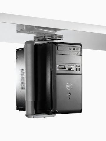 A black CPU mounted to the underside of a work surface with a Jaw CPU Holder. A black CPU mounted to the underside of a work surface with a Jaw CPU Holder.