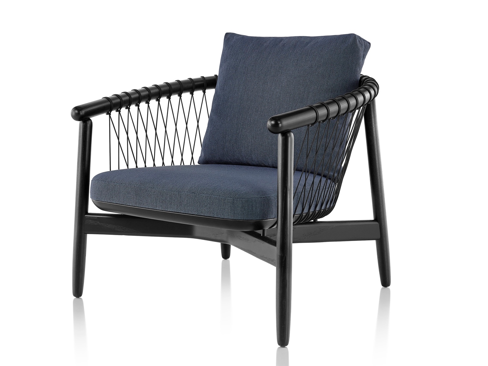 Navy blue upholstered Crosshatch Chair with black wood frame, viewed from the front at an angle. Navy blue upholstered Crosshatch Chair with black wood frame, viewed from the front at an angle.