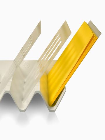 A putty-colored Diagonal Tray with three slots for papers or file folders. Select to go to the Diagonal Tray product page.