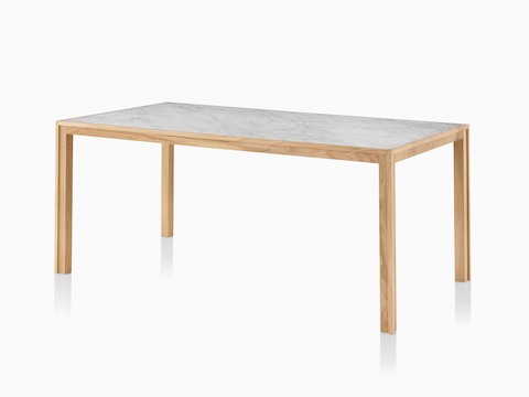An oak Doubleframe Table featuring a Carrara marble top, viewed from an angle.